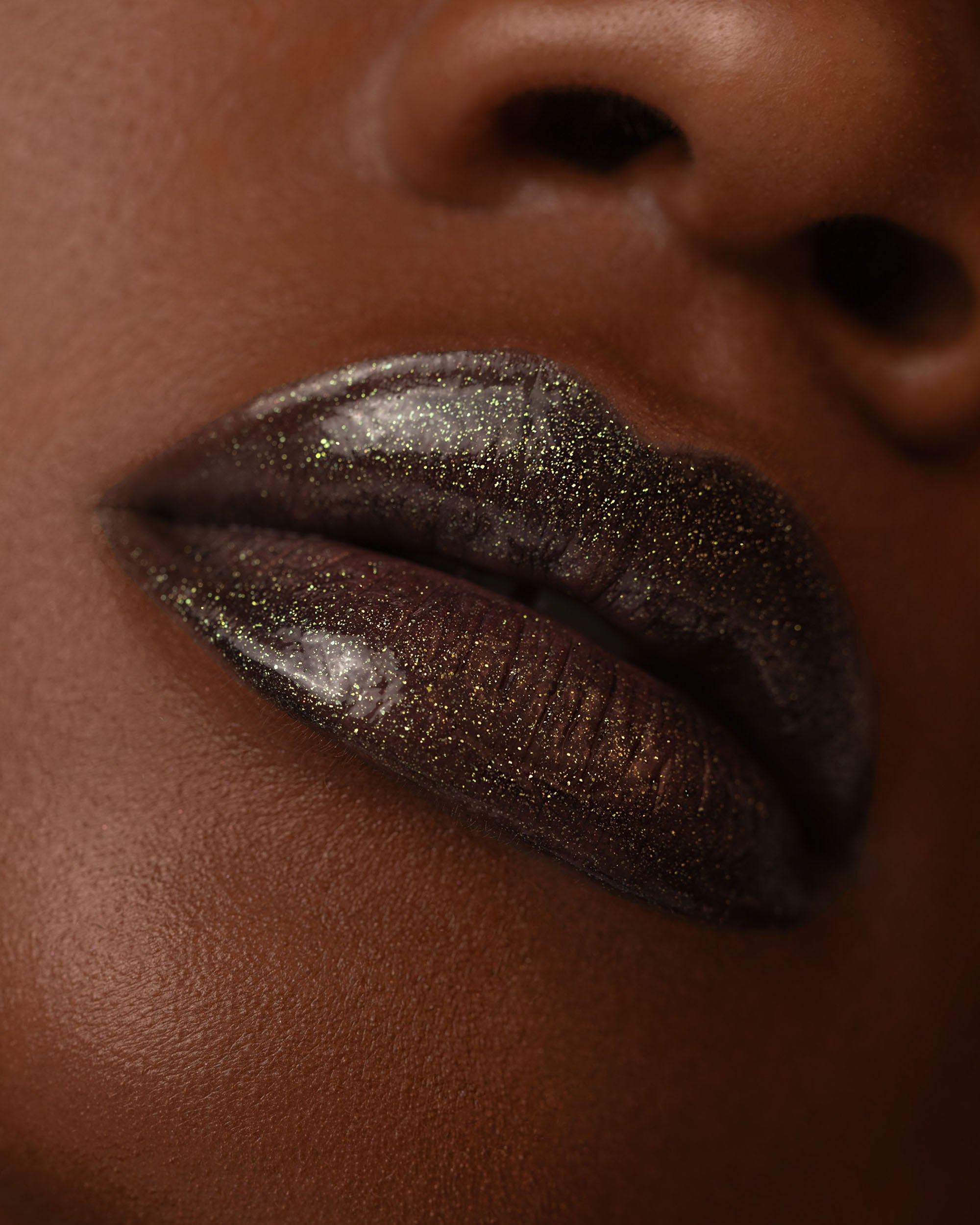Close-up lip macro of Night Glow Thorn Bite lip oil